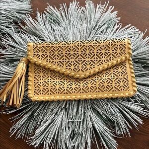 Francesca’s Elegant Tan Clutch with Tassel